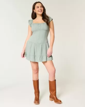 Vestido falda pantalón con mangas onduladas