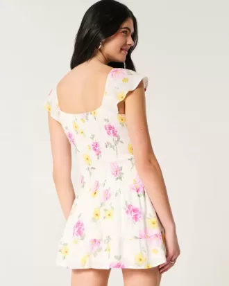 Vestido falda pantalón con mangas onduladas