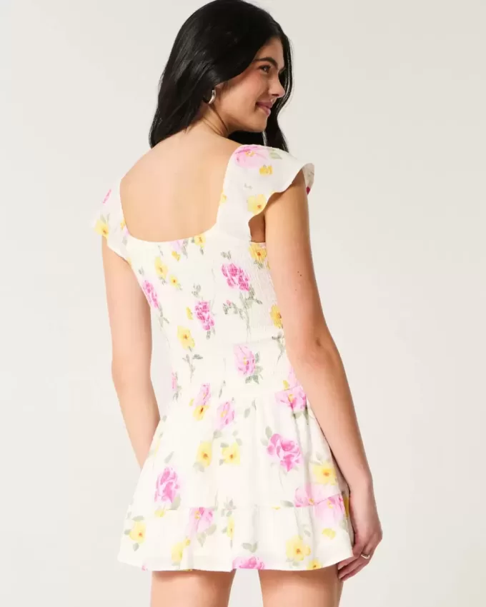 Vestido falda pantalón con mangas onduladas