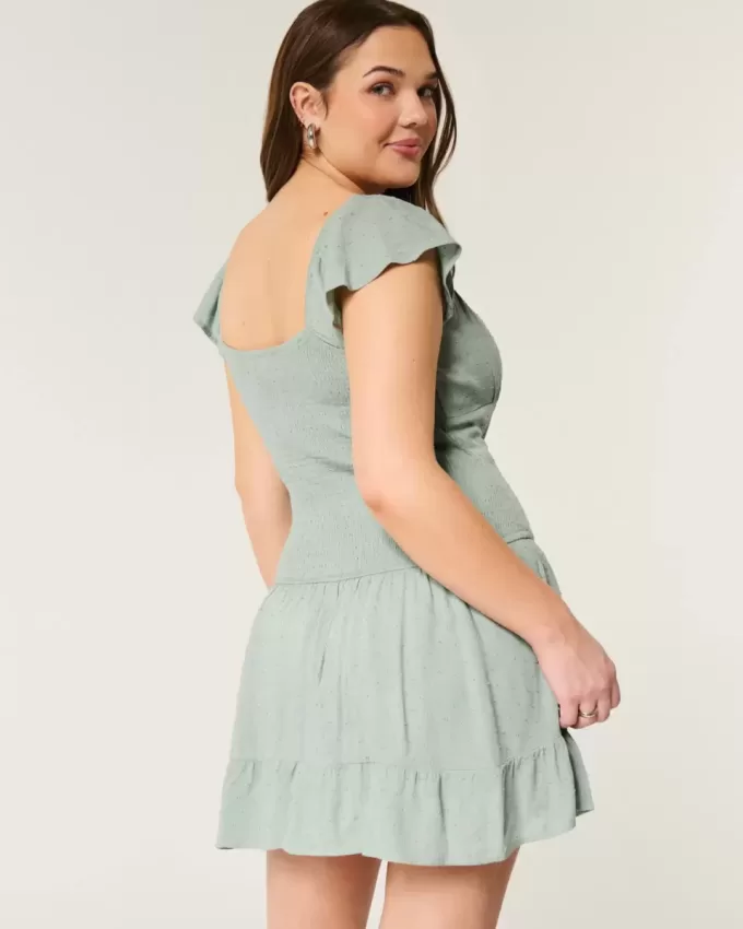 Vestido falda pantalón con mangas onduladas Vestido falda pantalón con mangas onduladas