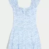 Vestido falda pantalón con mangas onduladas Vestido falda pantalón con mangas onduladas
