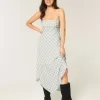 Vestido midi con dobladillo asimétrico Vestido midi con dobladillo asimétrico