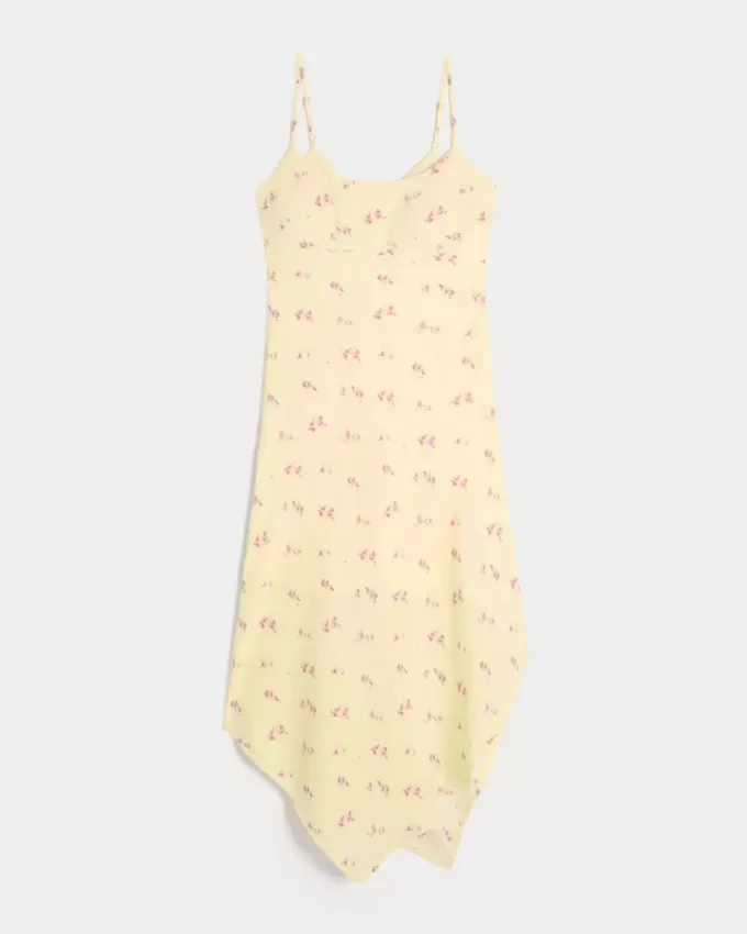 Vestido midi con dobladillo asimétrico Vestido midi con dobladillo asimétrico