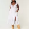 Vestido midi con doble lazo y mangas onduladas Vestido midi con doble lazo y mangas onduladas
