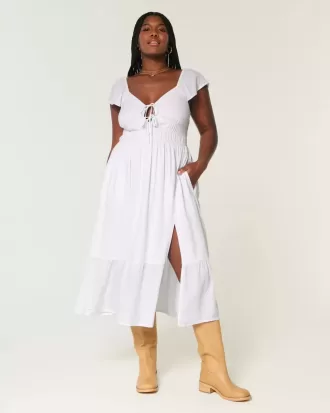 Vestido midi con doble lazo y mangas onduladas