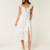 Vestido midi con doble lazo y mangas onduladas Vestido midi con doble lazo y mangas onduladas