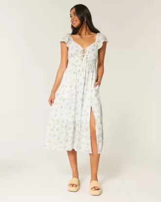 Vestido midi con doble lazo y mangas onduladas