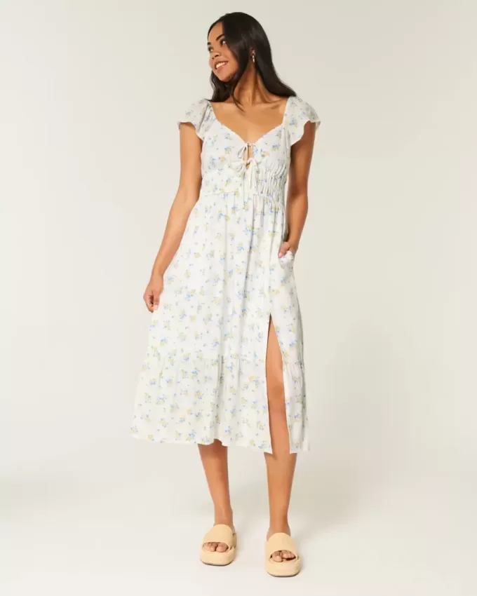 Vestido midi con doble lazo y mangas onduladas Vestido midi con doble lazo y mangas onduladas