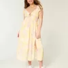 Vestido midi con doble lazo y mangas onduladas Vestido midi con doble lazo y mangas onduladas