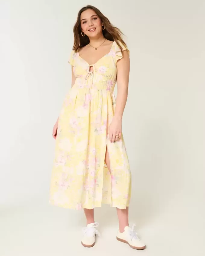 Vestido midi con doble lazo y mangas onduladas Vestido midi con doble lazo y mangas onduladas