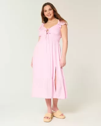Vestido midi con doble lazo y mangas onduladas