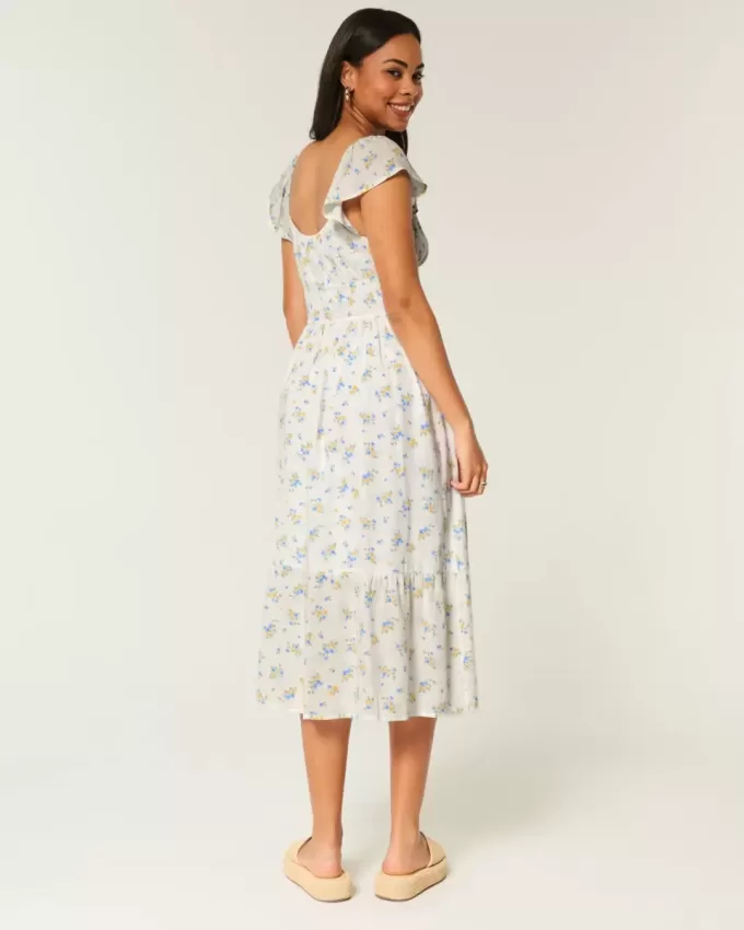 Vestido midi con doble lazo y mangas onduladas Vestido midi con doble lazo y mangas onduladas