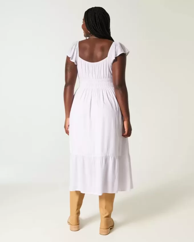 Vestido midi con doble lazo y mangas onduladas Vestido midi con doble lazo y mangas onduladas
