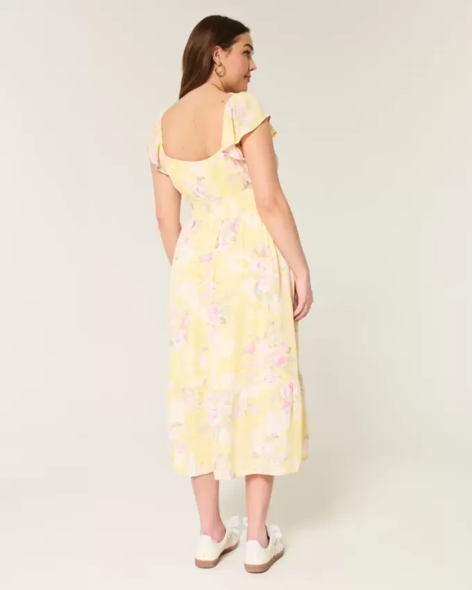 Vestido midi con doble lazo y mangas onduladas Vestido midi con doble lazo y mangas onduladas