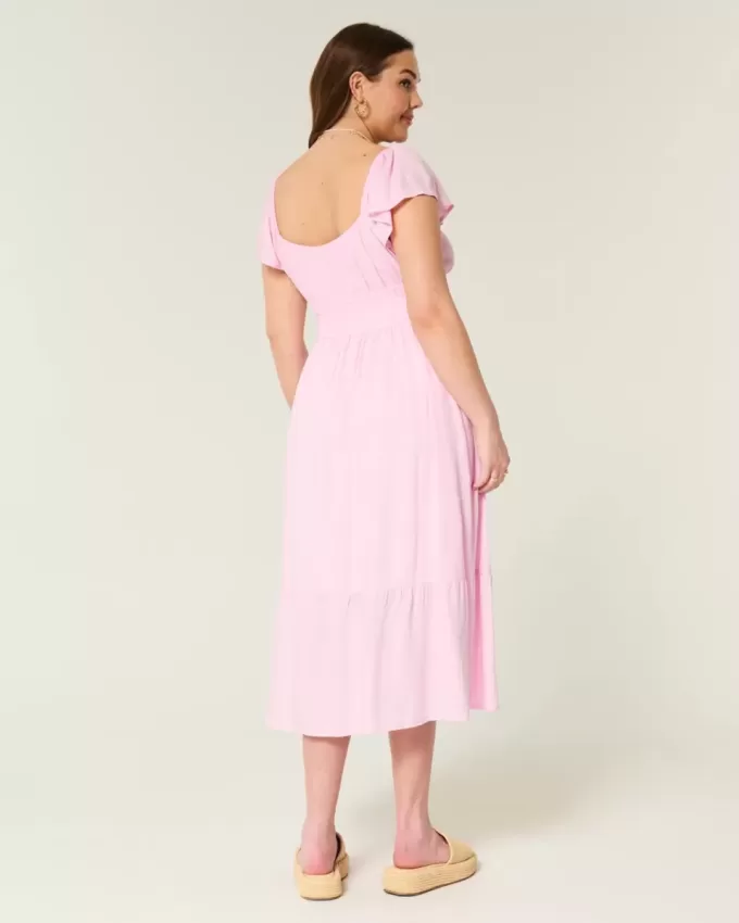 Vestido midi con doble lazo y mangas onduladas Vestido midi con doble lazo y mangas onduladas