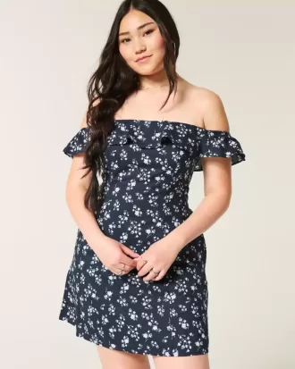 Vestido mini con volantes y hombros descubiertos en forma de A