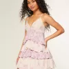 Vestido mini estilo babydoll con cuello en V y volantes Vestido mini estilo babydoll con cuello en V y volantes