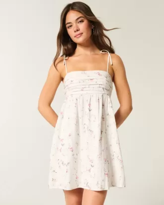 Vestido mini estilo babydoll con tirantes anudados