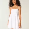 Vestido mini estilo babydoll con tirantes anudados Vestido mini estilo babydoll con tirantes anudados