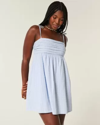Vestido mini estilo babydoll con tirantes anudados