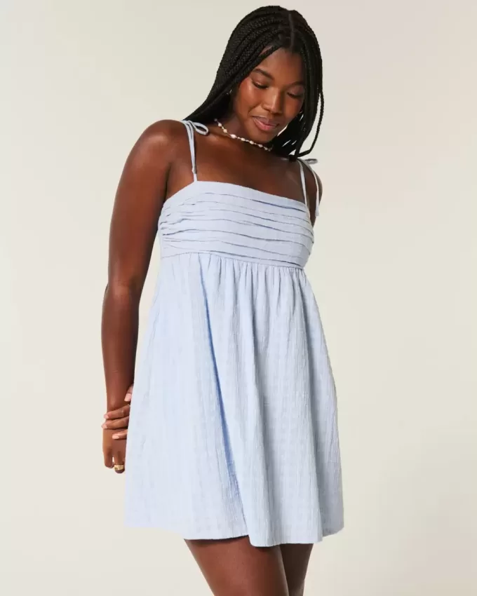 Vestido mini estilo babydoll con tirantes anudados Vestido mini estilo babydoll con tirantes anudados