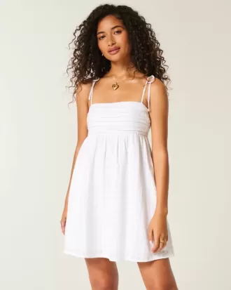 Vestido mini estilo babydoll con tirantes anudados