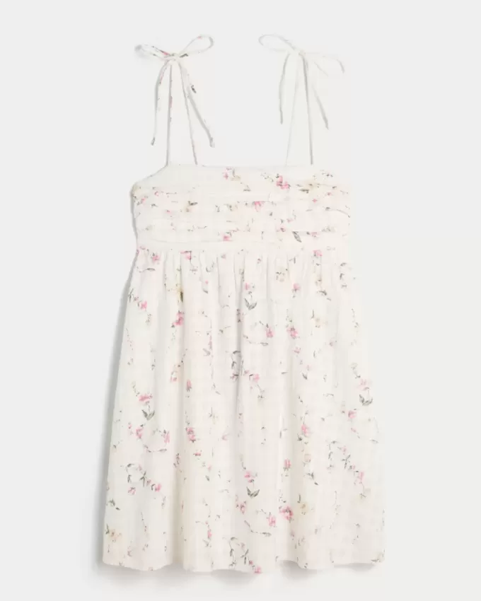 Vestido mini estilo babydoll con tirantes anudados Vestido mini estilo babydoll con tirantes anudados