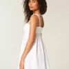 Vestido mini estilo babydoll con tirantes anudados Vestido mini estilo babydoll con tirantes anudados