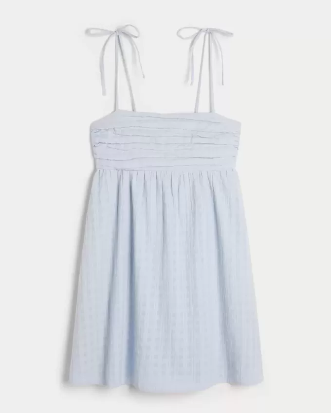 Vestido mini estilo babydoll con tirantes anudados Vestido mini estilo babydoll con tirantes anudados