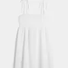 Vestido mini estilo babydoll con tirantes anudados Vestido mini estilo babydoll con tirantes anudados