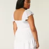 Vestido minifalda con mangas onduladas y busto ajustado Vestido minifalda con mangas onduladas y busto ajustado