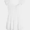 Vestido minifalda con mangas onduladas y busto ajustado Vestido minifalda con mangas onduladas y busto ajustado
