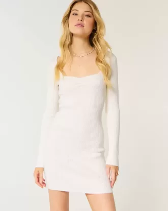 Vestido tipo suéter de manga larga con escote ceñido y espalda abierta