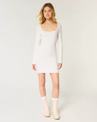 Vestido tipo suéter de manga larga con escote ceñido y espalda abierta
